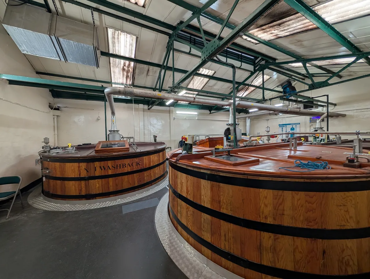 The fermentation tubs. They’re actually about 7m tall, most of which is below the floor level. Oban ferments in these wooden barrels because there’s no good way to put stainless tanks in there (they’d have to take the roof off and use a crane). These tubs have a working life of about 40 years, after which time they are disassembled in place, and replaced slat by slat by another tub that is assembled there.