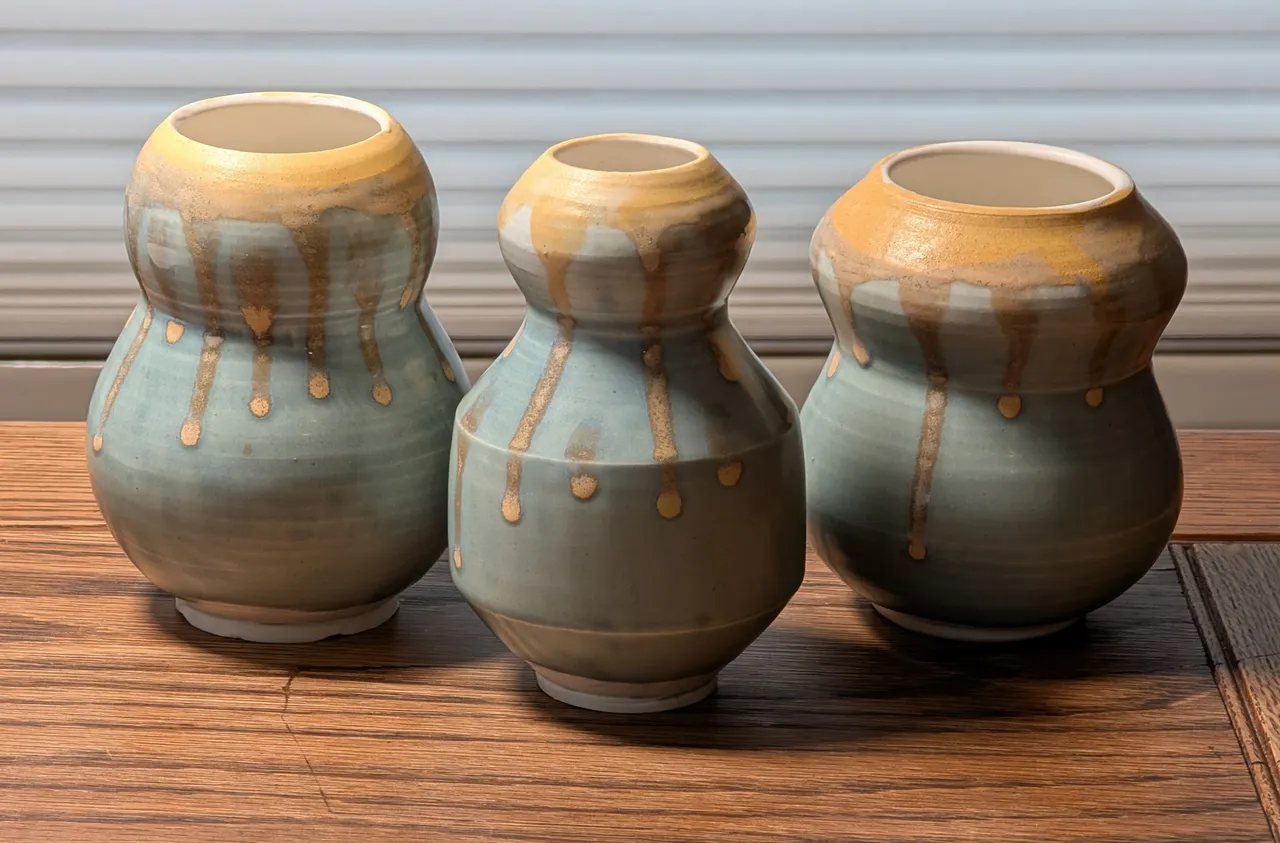 This is a return to the glaze mix from above- blue and gold, but this time on a porcelain clay body. This is from pretty late in the year; I have been obsessed with these bulbous or gourd-like vase shapes. I really enjoy throwing the form. I have an optimal shape in my head, and none of these are it. Someday, hopefully in 2026 I’ll get the perfect one done. I want the right ratio of bottom to top, the correct aspect ratio, and a narrow top neck.