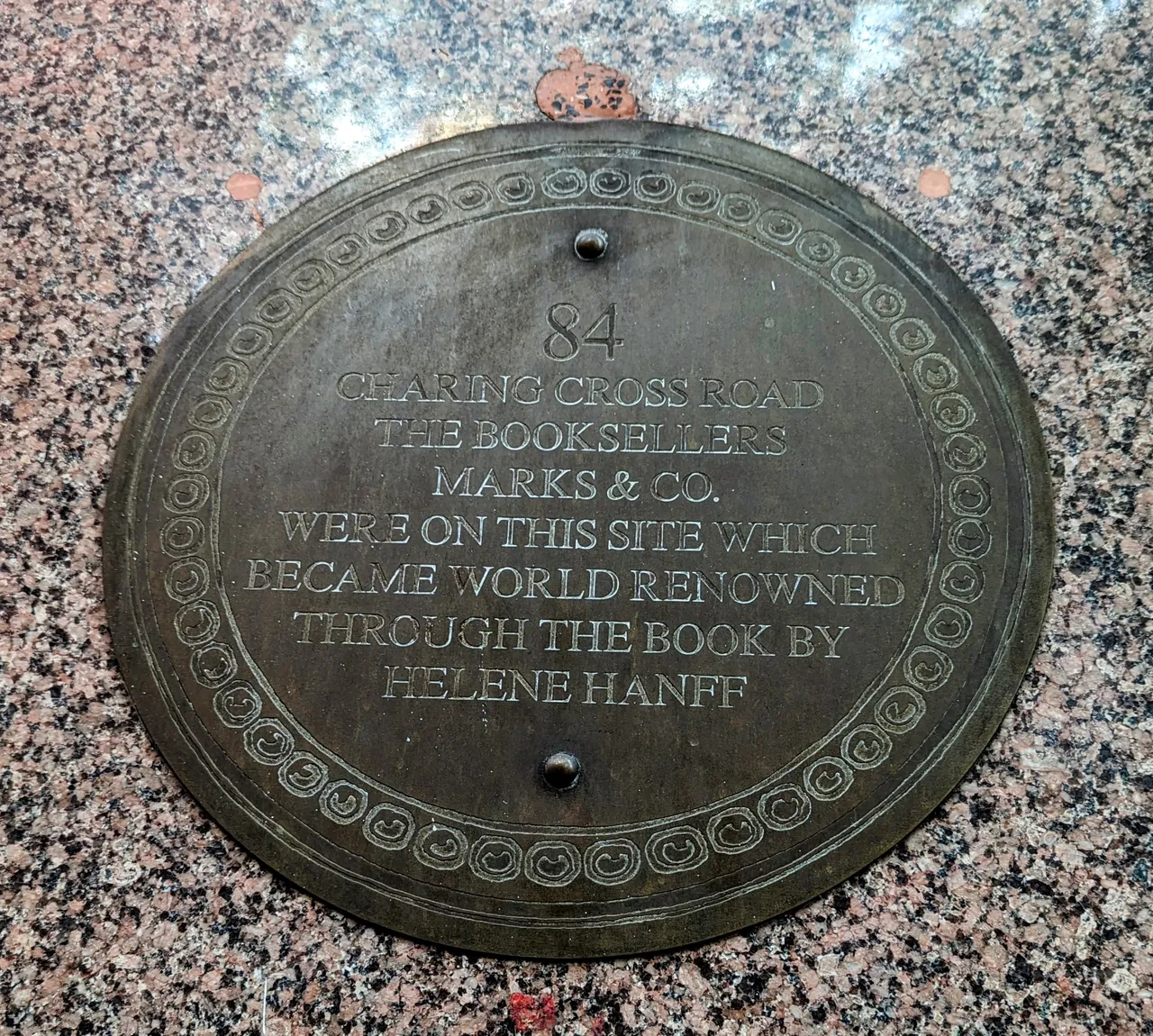 Marker at 84 Charing Cross Road, explained here