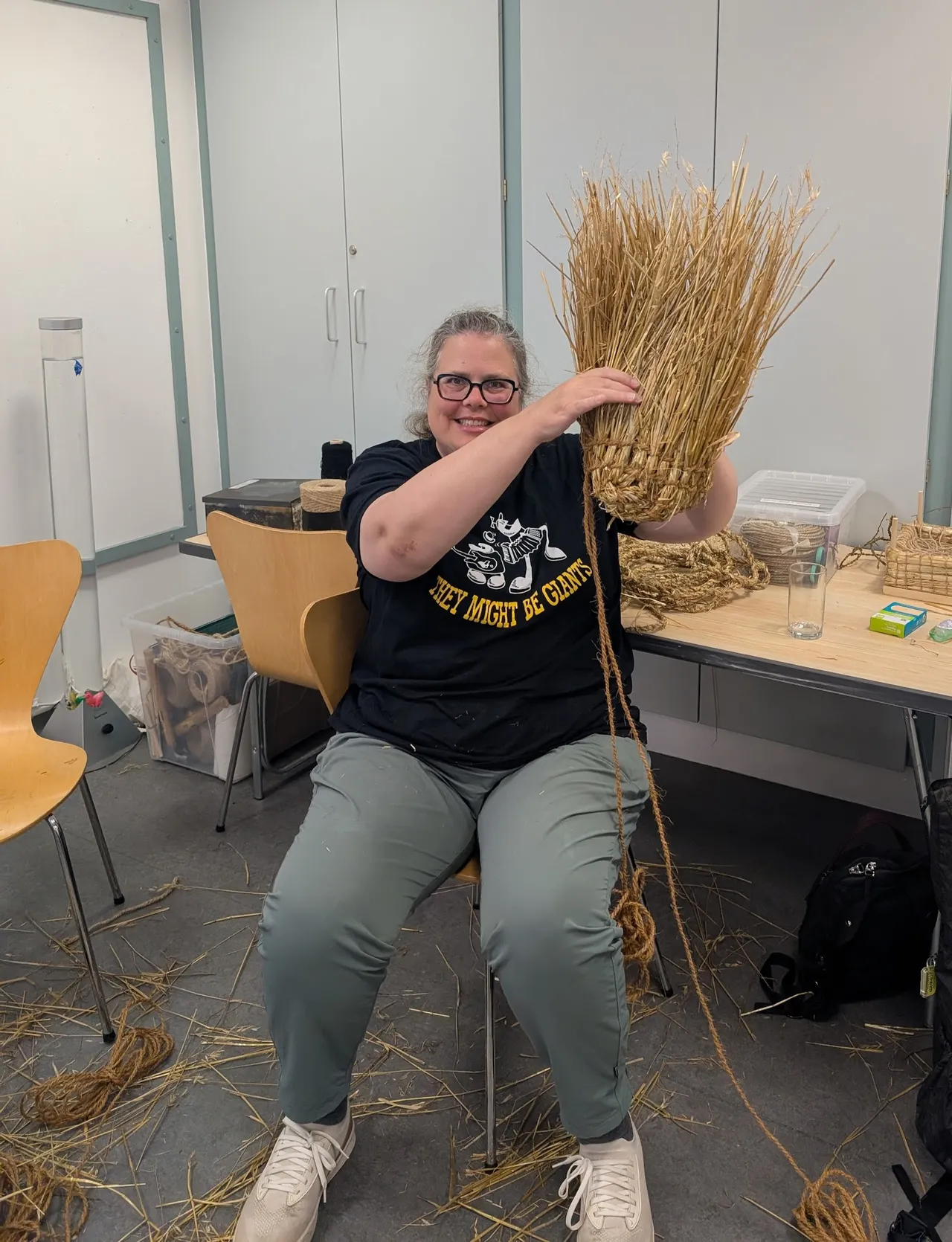 It surprised Chrissy how much I liked the act of weaving these baskets, so I should mention here: I had a really good time. It was physically challenging, but I could see the basket forming in my hands. It felt like I was learning some fundamental techniques (I could see how twining was like to but different from weaving, how it was used in these baskets, in the chairback forming that Eve did, and in our hats) that I could apply in a lot of ways. It was also just fun to take a bunch of grass and turn it into a shaped thing, much the same way as pottery is turning mud into something useful (or not useful). There’s just a joy to making.