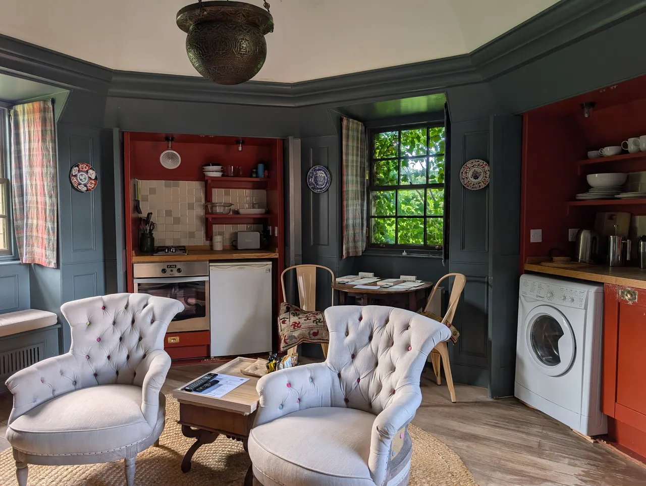 It’s a two-storey cottage that Chrissy and I are in, this is our sitting room; I’m at that table in the window as I type this.