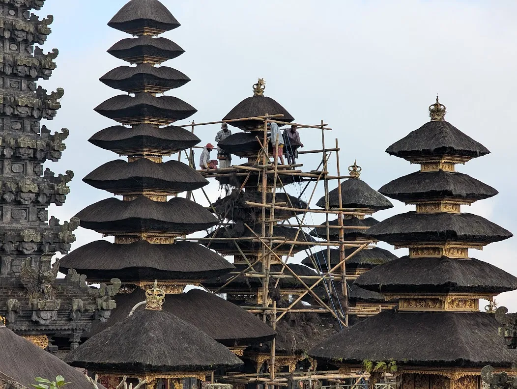 Thatched roof being repaired. The thatching lasts around five decades, so in the thousand-plus year history of the temple, they have had to build a lot of roofs.
