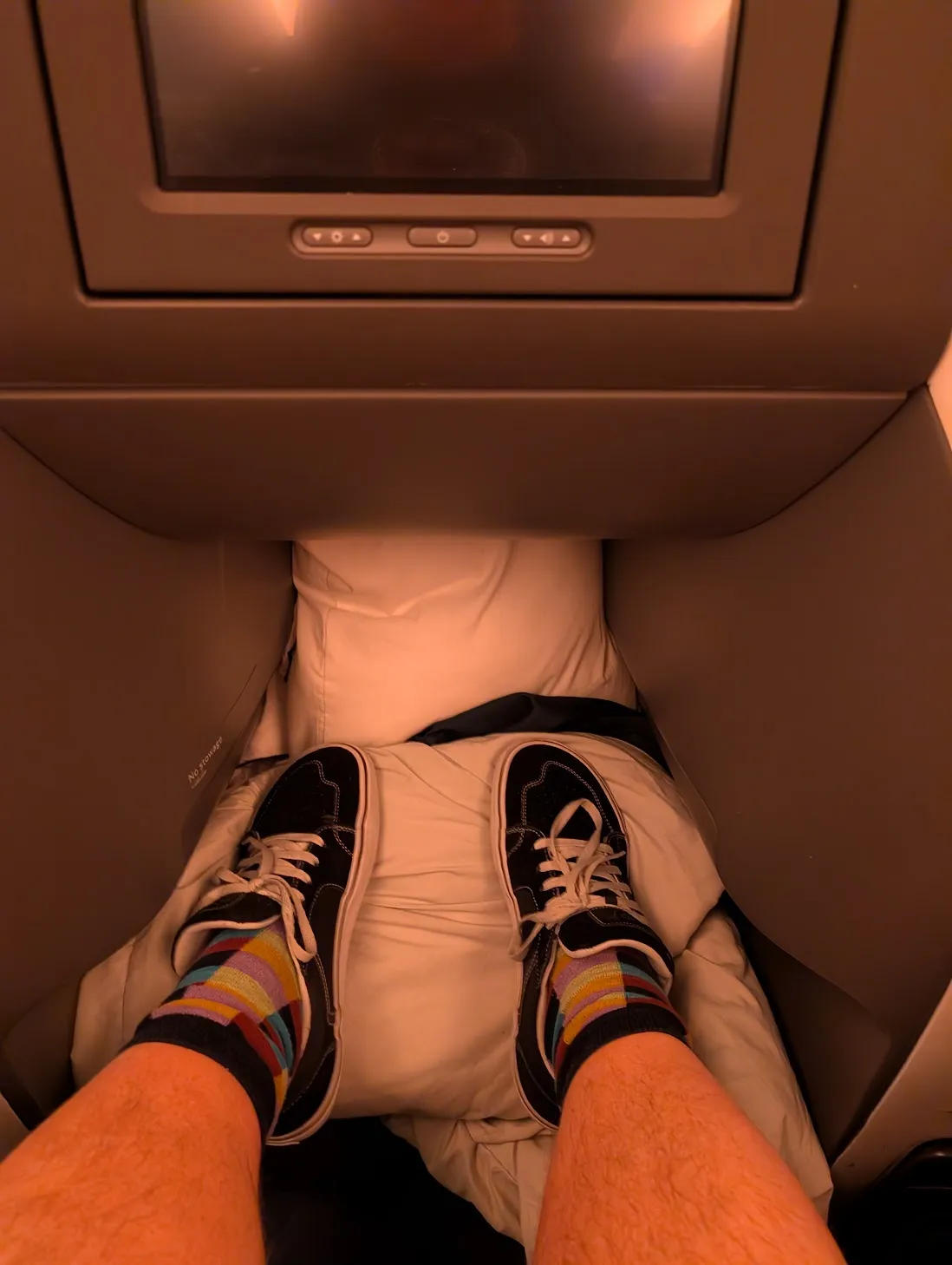 Good thing there was nowhere else to put the bedding, since my feet literally couldn’t touch the ground when I was sitting in the weirdly high chair. Bummer about not being able to stick my backpack under the seat in front of me, and bummer i ended up putting my shoes all over the blanket.