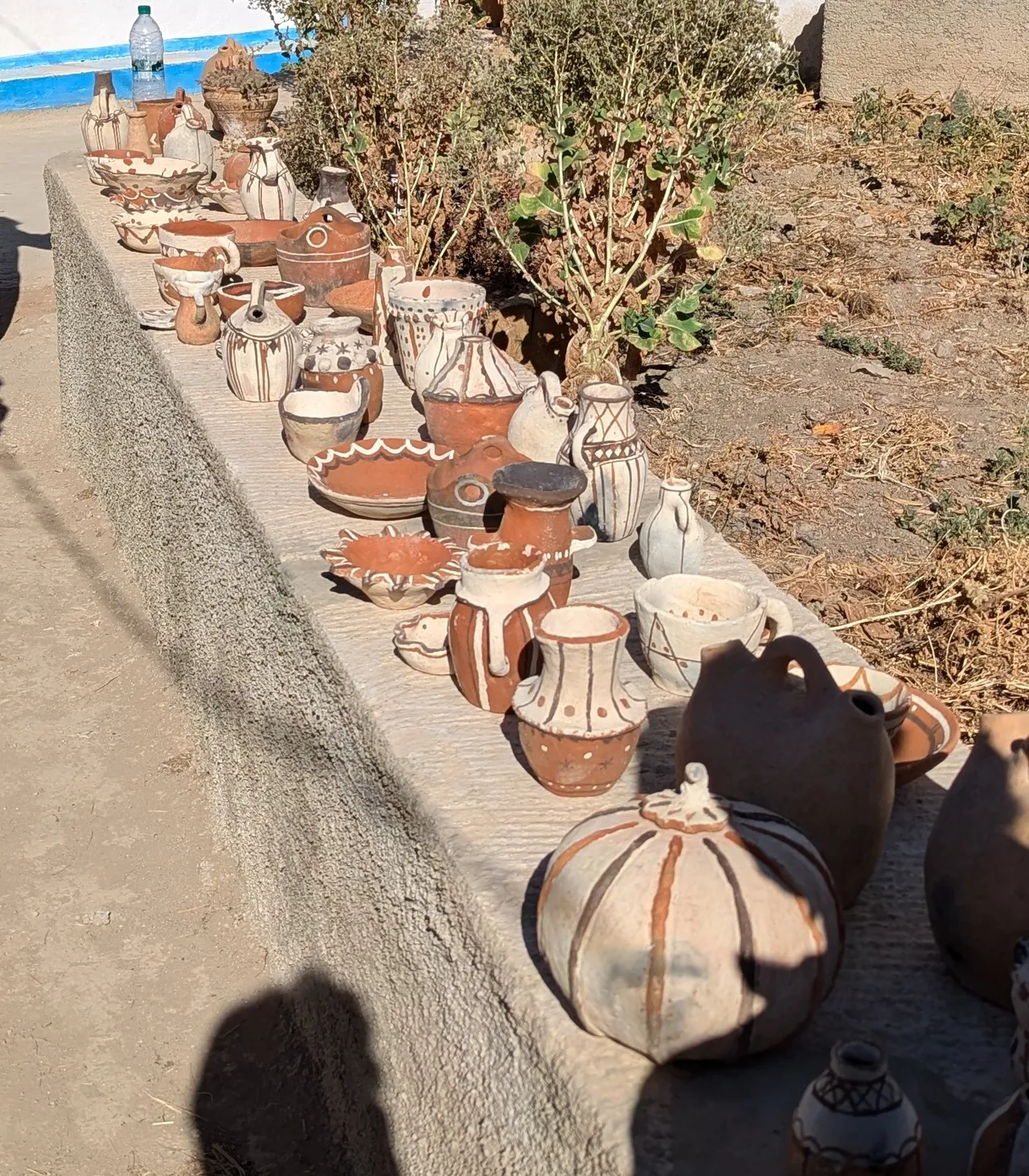 Everybody's pots. Water bottle was not handmade.