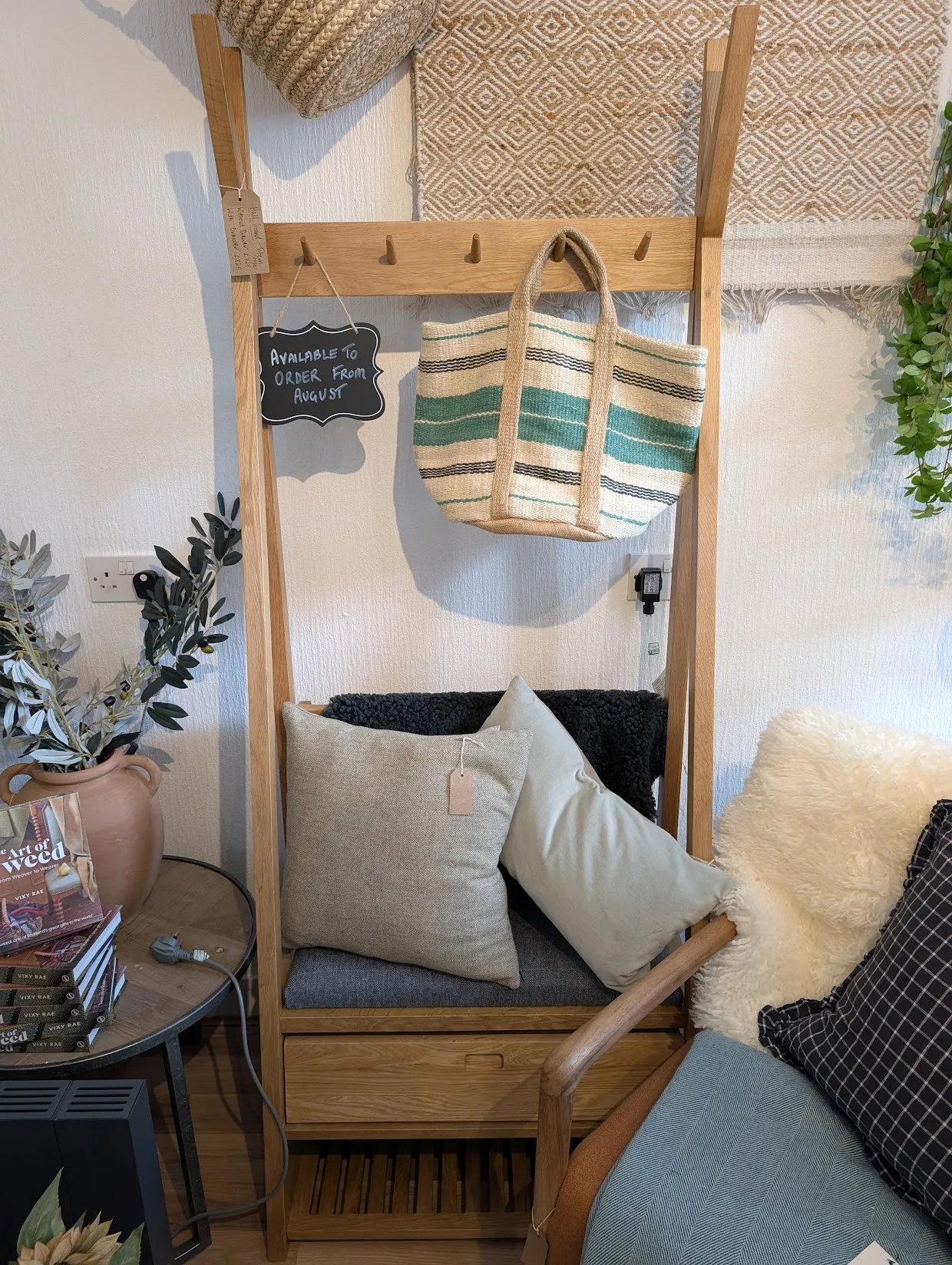 I think we kind of need something like this for our house. A place to sit and put on your shoes (although this one is for very small humans, so bigger?) plus a few pegs for coats or cloaks. I really wish I had a cloak.